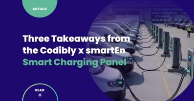 European electric fleet depot with white delivery vans connected to smart charging stations, illustrating large-scale EV fleet charging infrastructure