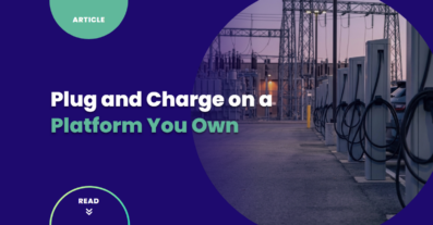 Roadside DC fast-charging plaza at dusk with charging cables connected to parked electric vehicles and a distribution substation behind, illustrating Plug and Charge on an owned EV charging platform.